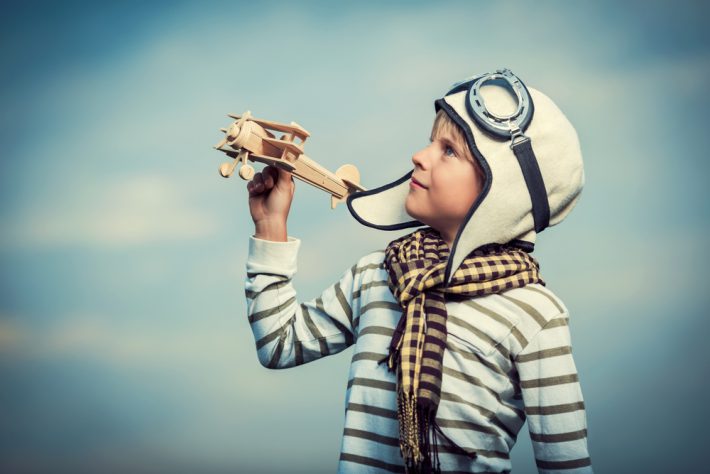 boy with toy plane