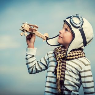 boy with toy plane