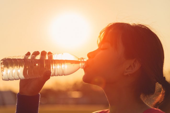 woman hydrating