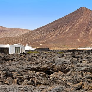 Rustic house in an arid landscape in Tahiche, Lanzarote, Canary Islands