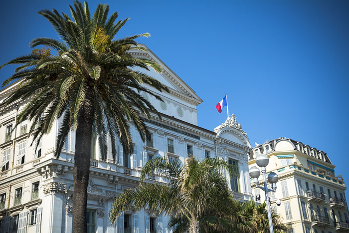 Nice opera house and palm trees on French Riviera