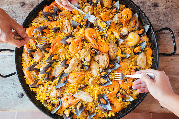 Eating mixed paella