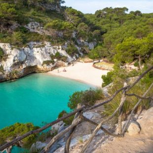 Spend a tranquil day on the beach at Menorca's Cala en Turqueta